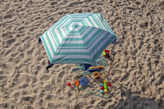 Parasol and sand toys, beach, Kühlungsborn, Mecklenburg-Vorpommern, Germany, Europe