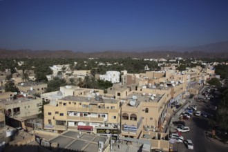 View of the city and the palm gardens of Nizwa from the fort. Nizwa is the centre of the Omani