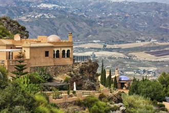 Luxury holiday home on the hillside, Moorish style with terrace, garden and domes, view from above,