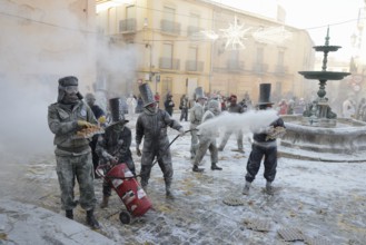 Els Enfarinats flour fight, rebels, armed with flour, eggs and firecrackers, take over the regiment