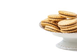 Double biscuits in white bowl, white background, copy space