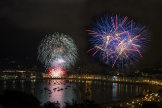 Panorama with fireworks, at night, view from Monte Igueldo, San Sebastian, Donostia, Basque