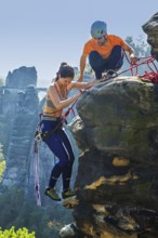 Climbers in Rathen in Saxon Switzerland