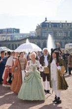 Baroque performers in the Zwinger, the tradition of past festivities and court ceremonies at the