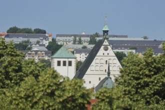 View of tower of Nikolai Church and gable with spire of St. Mary's Cathedral, Freiberg, Saxony,