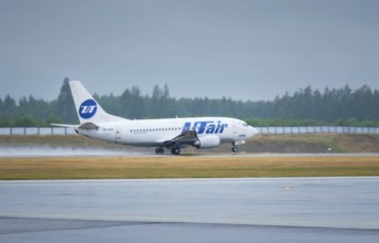 MINSK, BELARUS, JUNE 15, 2018: UTAir flight Boeing 737-500 plane taxi on runway in National Airport