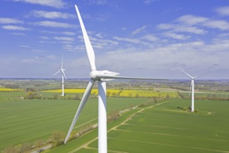 Aerial view over wind turbines at wind park, windfarm in North Frisia, Nordfriesland,