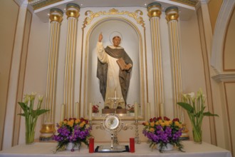 Figure of San Vicente above the altar of the Ermita de San Vicent chapel in Cautivador or