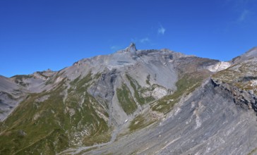 The rock tooth Tita Seri stretches into the blue sky, Bernese Alps, Ovronnaz, Valais, Switzerland,