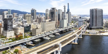 Kobe skyline from above with harbour and elevated road panorama in Kobe, Japan, Asia