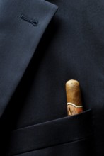 Cigar in suit bag, smoking