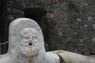 Drinking water fountain in the ruined city of Herculaneum, Campania, Italy, Europe