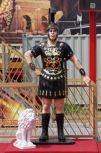 Roman general, life-size figure in front of a fairground ride at the Düsseldorf Rhine Fair,