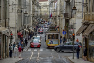 Street scene with tram, Lisbon, Portugal, Europe