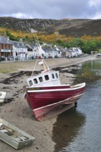 Fishing boat in the harbour of Ullapool, Highlands, Scotland, UK