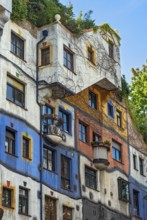 Colorful Facade of Hundertwasserhaus, apartment house designed by Friedensreich Hundertwasser in