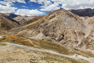 Manali-Leh highway in Himalayas with buses. Ladakh, India, Asia