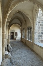 Combrailles region. Menat village, cloister of the Benedictine Abbey (12th century), Puy de Dome