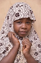 Girl wearing a headscarf, Stone Town, Zanzibar City, Zanzibar, Tanzania, Africa