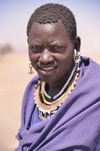 Maasai man wearing traditional dress, Ngorongoro Conservation Area, Ndema, Tanzania, Africa