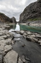 Stuðlagil Canyon, turquoise river between basalt columns, Egilsstadir, Iceland, Europe