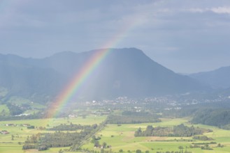 Panorama from the Grünten over the Illertal with rainbow to Immenstadt, behind it the Mittagberg,