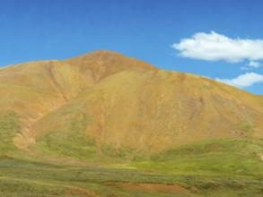 Yellow mountains, blue sky, highlands of Tibet, China, Asia