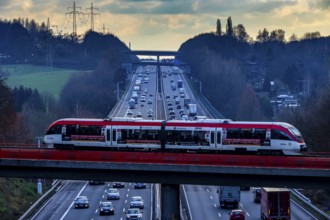 A3 motorway between Düsseldorf and Leverkusen, near Erkrath, railway bridge, Regio train