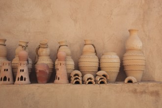 Clay jars in the courtyard of Nizwa Fort. Nizwa is the centre of the Omani heartland. The oasis