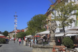 In the city centre of Bayreuth, the Famabrunnen and guild tree in the pedestrian zone, Bayreuth,