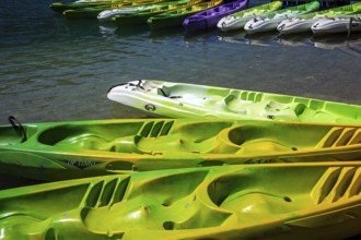 Colourful canoes in the boat harbour in Esparron-de-Verdon, Lac d Esparron, Provence-Alpes-Côte