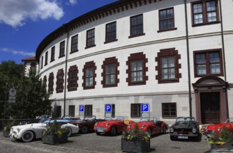 Vintage car parade in front of the castle, round building of Elisabethenburg Castle, Meiningen,