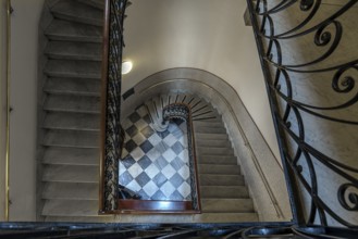 Staircase around 1900 with a wrought-iron banister, in a residential building, Genoa, Italy, Europe