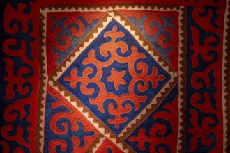 Traditional carpet with pattern, exhibition in the State History Museum, interior view, Bishkek,