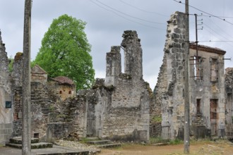 Ruins along the main road The burnt village of Oradour-sur-Glane was destroyed on 10 June 1944 when