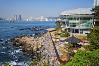 BUSAN, SOUTH KOREA, APRIL 13, 2017: Nurimaru APEC House on Dongbaek island and Gwangan bridge in