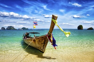 Long tail boat on tropical beach, Krabi, Thailand, Asia