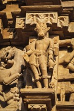 Stone carving bas relief sculptures on Vaman Temple, Khajuraho, Madhya Pradesh, India, Asia