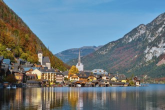 Austrian tourist destination Hallstatt village on Hallstatter See lake in Austrian alps in autumn.