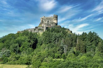 Murol castle built on a basalt promontory in the 13th century. Auvergne Volcanoes Natural Park. Puy