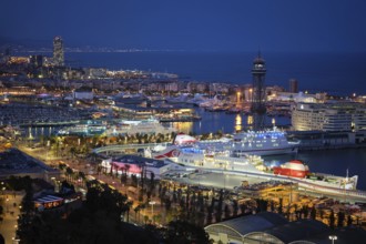 BARCELONA, SPAIN, APRIL 15, 2019: Aerial view of Barcelona city skyline with city traffic and port