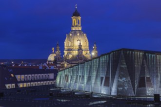 Copper roof of the Dresden Palace of Culture with view of the Church of Our Lady