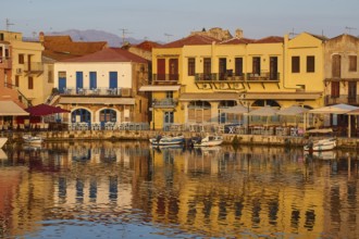 Morning light, sunrise, Venetian harbour, row of houses, colourful houses, reflections in the