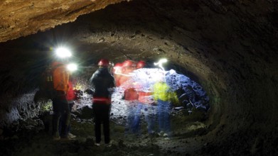 Lava Tunnel, Exit, Headlamps, Visitors, Blurred, Etna, Volcano, Eastern Sicily, Sicily, Italy,