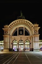 Archway on the station square, light installation at dusk, Lilu, Light Festival 2023, Lucerne,