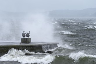 Sculpture of swans in a storm on Lake Zug, Zug, Canton Zug, Switzerland, Europe