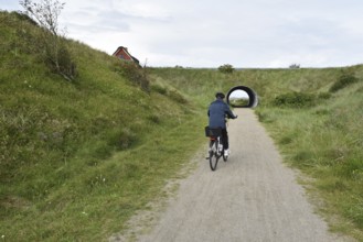 Woman riding a bicycle in Denmark