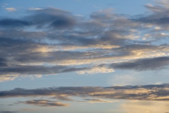 Cloud formation in front of sunset, Germany, Europe