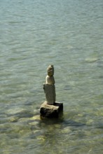 Stacked stones at sea, balance, equilibrium, equilibrium