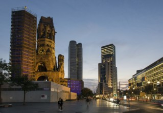 Evening atmosphere in Berlin's City West with the Bikini Sopping mall, right, the Memorial Church,